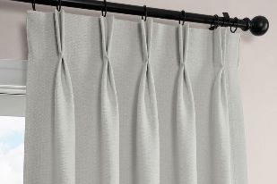 Neutral tone pinch pleat curtains