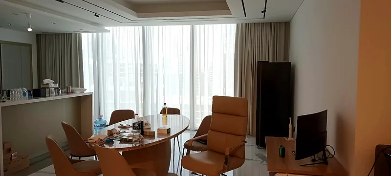 Sheer and dim-out curtains in a Dubai office